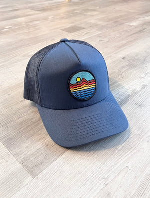 
            
                Load image into Gallery viewer, Mountain Range Water Patch Trucker Hat Navy
            
        