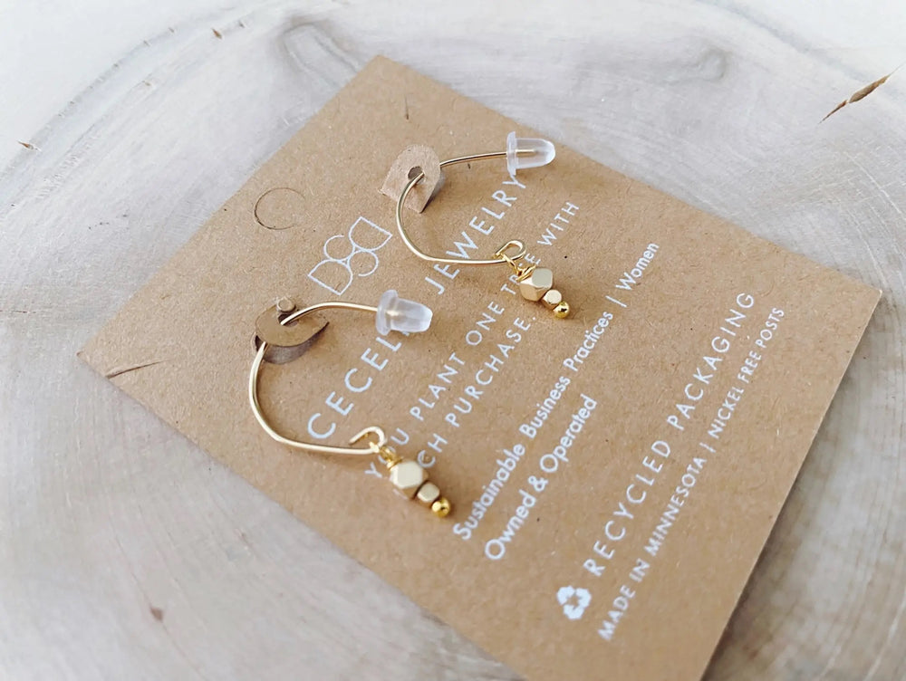 
            
                Load image into Gallery viewer, Cecelia Matte Gold Faceted Loop Earrings
            
        